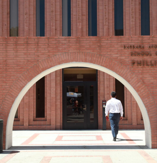 Student walking into facility at USC Rossier