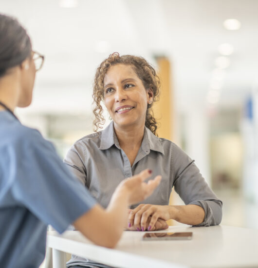 Woman meets with counselor