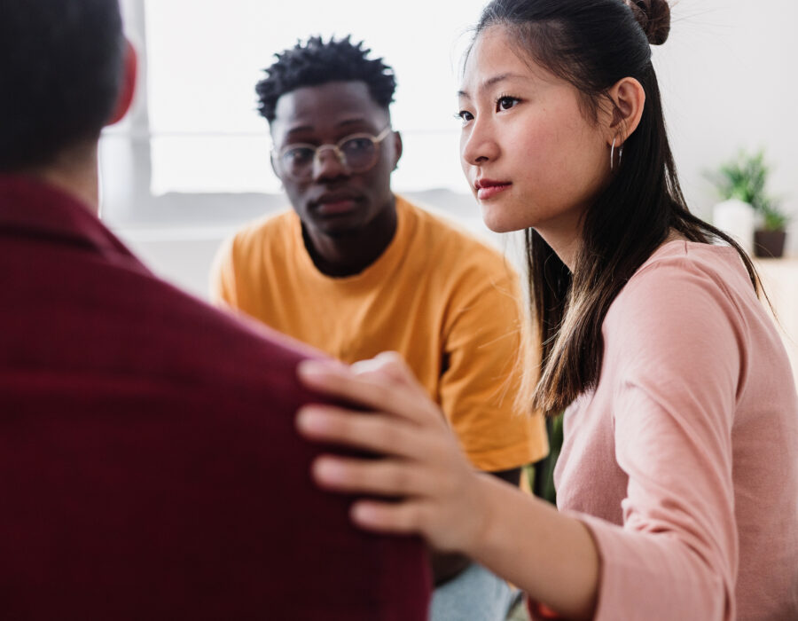 Woman assisting client during counseling session