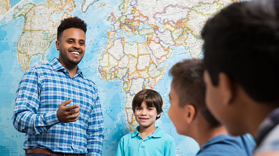 Teacher with students